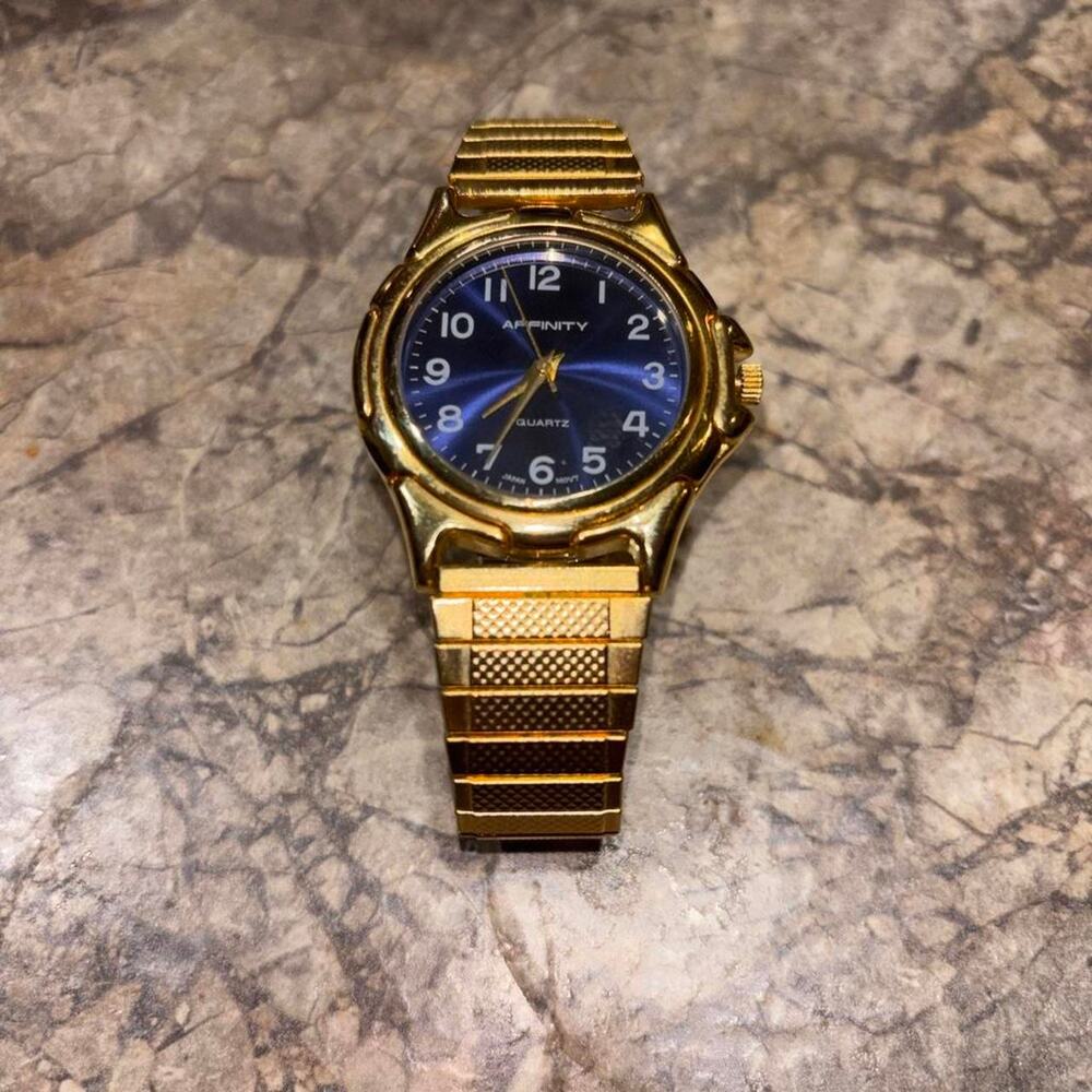 Affinity gold watch with blue